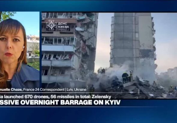 A massive overnight barrage on Kyiv splits a residential building in two
