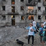 Russian missiles and drones kill 11 and cause damage across Ukraine capital